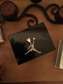 Sterling silver diamond cut Jordan Charm