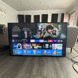 65” Roku Select Series Smart TV (Model 65R4A5X) – Like New + Mounting Available