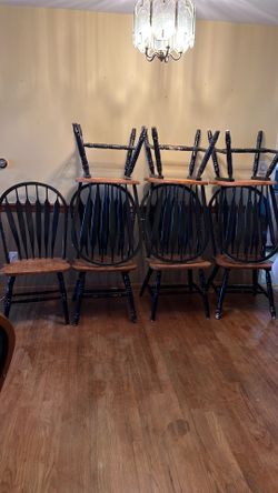 7 chairs, still solid. Price is for the set.