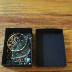 Box Of Random Earrings And Other Unique Charms. Message me anytime if interested will send more pictures or videos thank you.