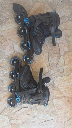 Kids size 5 roller blades like new