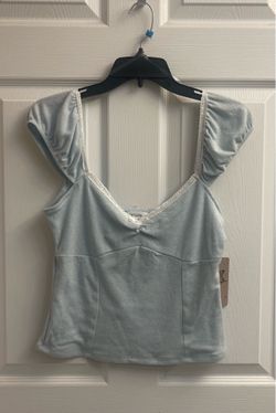 Brand new light blue off the shoulder top size M Juniors