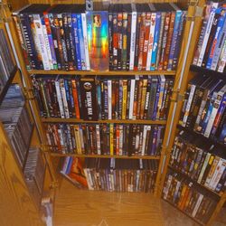 Hundreds Of DVDs And CDs 
