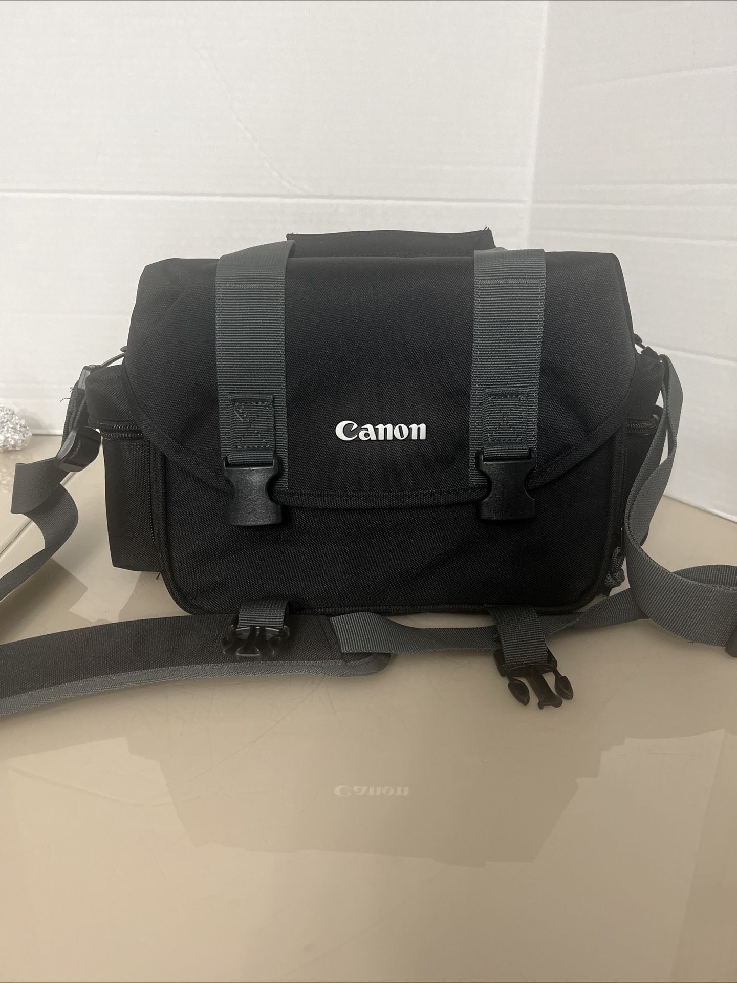 Canon 300DG Black Digital Gadget Bag For all EOS and Rebel Cameras. Pre owned in excellent condition and comes with a strap and the dividers.  