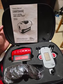 Laser level with safety glasses and carrying case