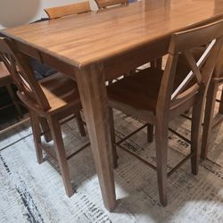 Solid Wood Table And 7 Chairs 