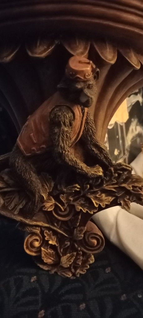 Vintage resin bellhop monkey sconce display shelf