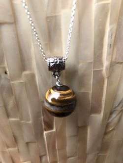 Tigers eye pendant with sterling silver chain 20 inches length