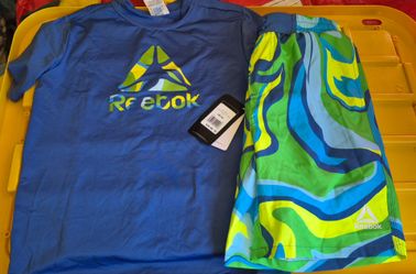 New boys swim trunks and shirt size 10/12