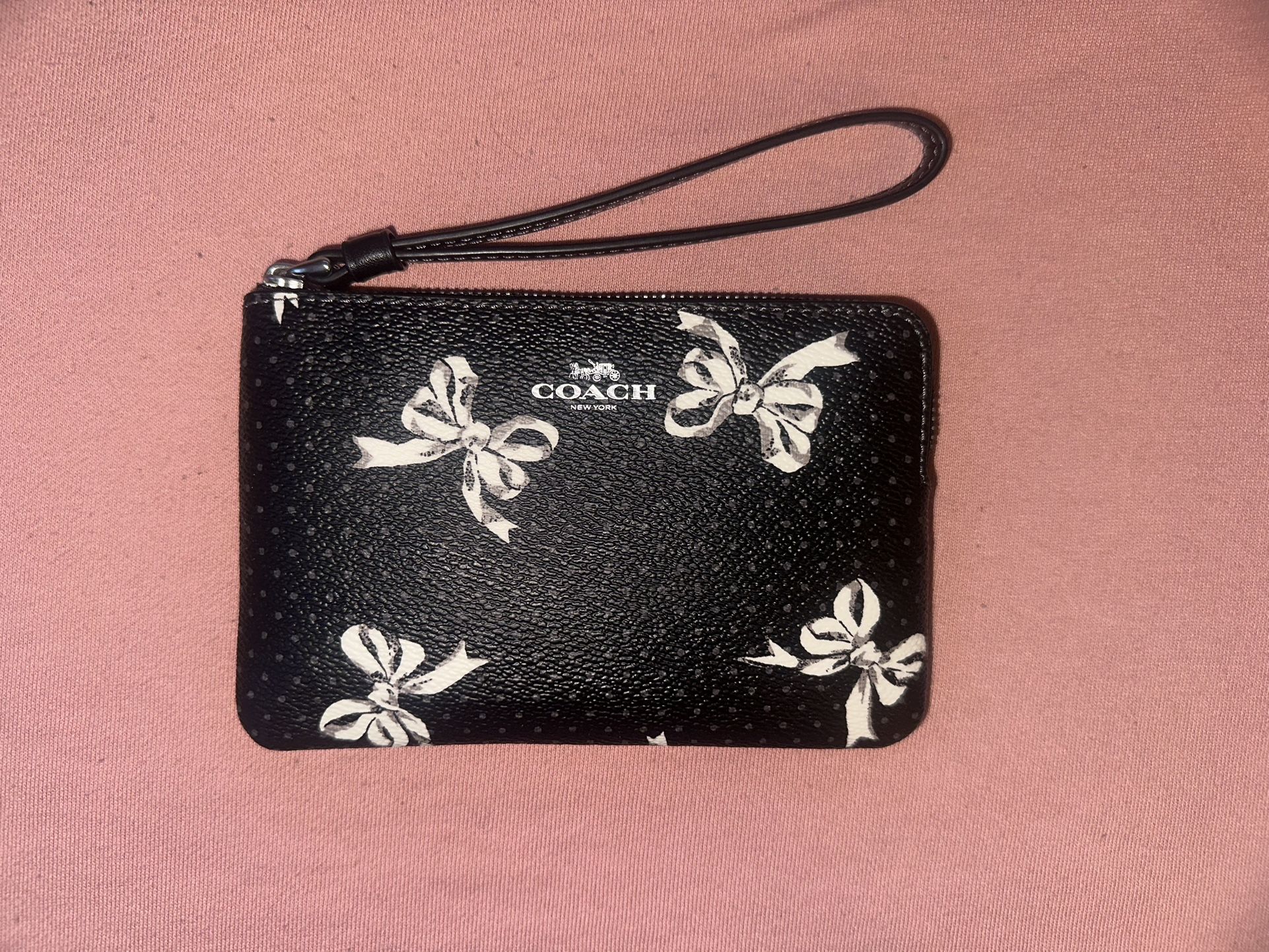 Coach leather Wristlet with Bow Print