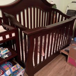 Crib, Changing table And Dresser Set. Color Is Mahogany