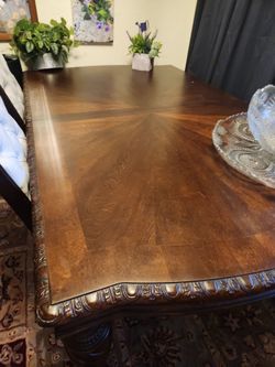 Ashley large solid Dining table with two leaves and 2 chairs