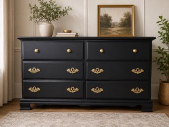 Black dresser with gold handles
