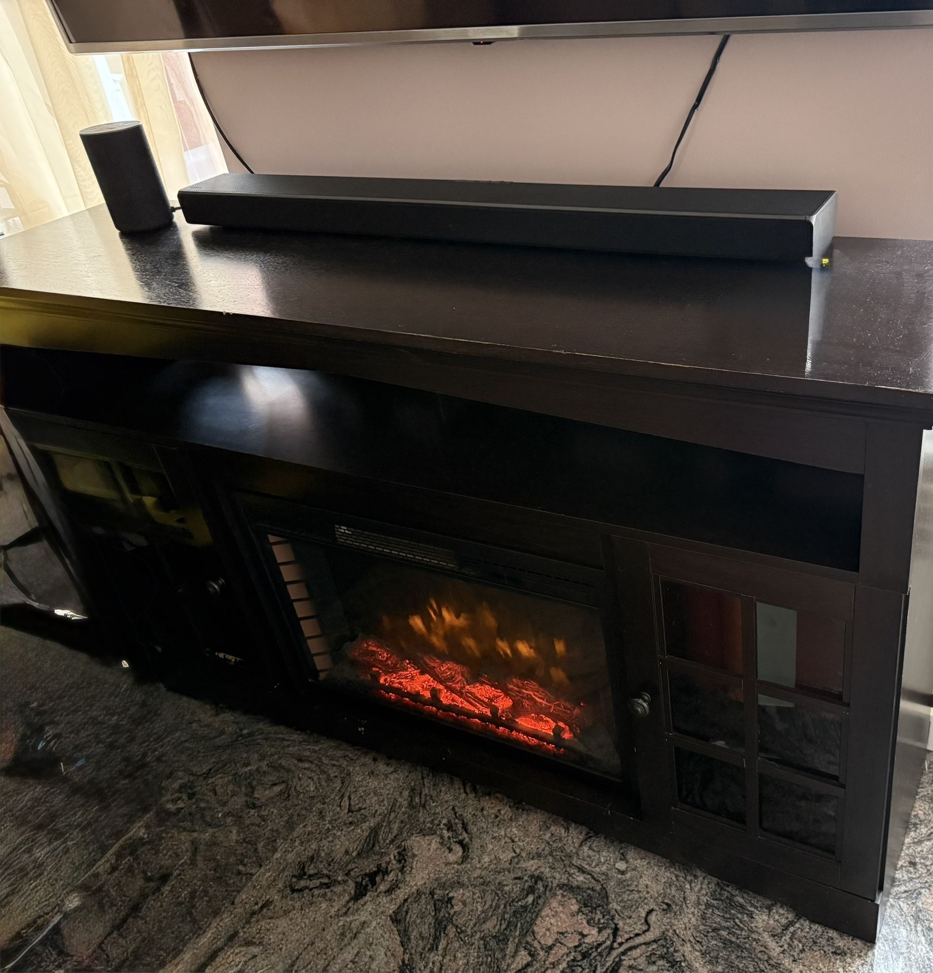 Under TV Stand With Electical Fire.  