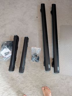 Thule WingBar Evo Load Bars (50in) + Thule Snowpack Ski (M) + Thule  EVO Raised bars + Key System