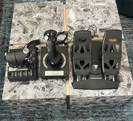 Logitechs X56 HOTAS RGB Throttle and Stick with Thrustmaster Flight Rudder Pedals