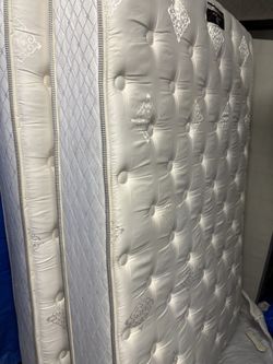 11 inch thick Full XL pillow top mattress. $80. Box springs and delivery also available.