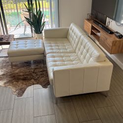 White Faux leather Couch With Legs Rest. 