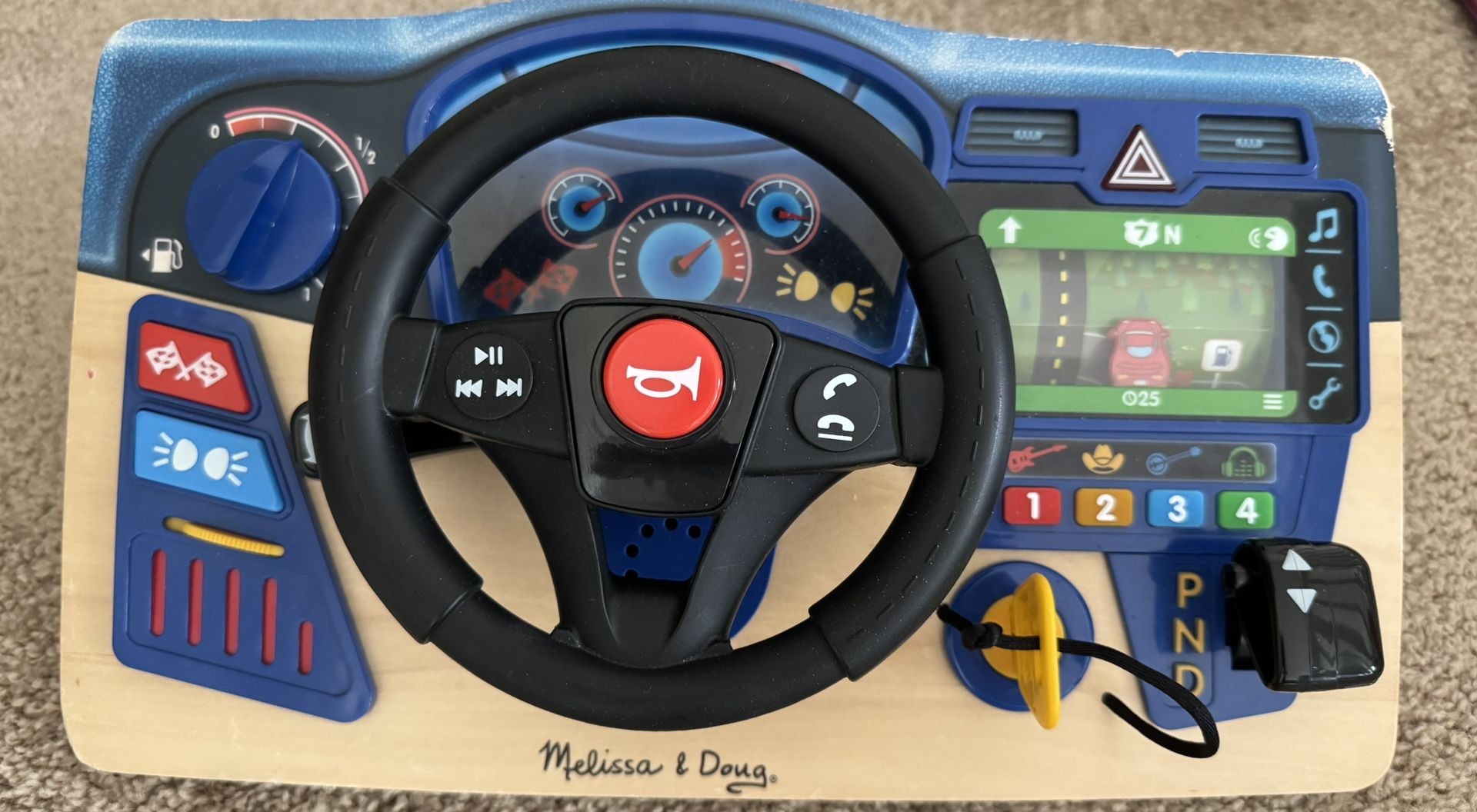 Melissa & Doug Interactive Wooden Dashboard Steering Wheel