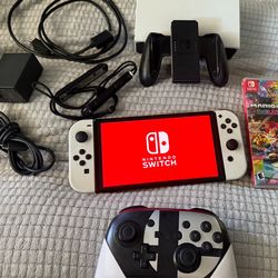 Nintendo switch oled mint condition bundle