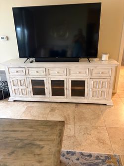 Whitewashed Wood TV Console with Glass Doors