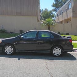 2003 Toyota Corolla  Trade For Harley Sportster 