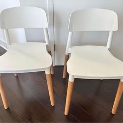 White Dining Chair with tapered wood legs and polypropylene top (Set of 2) AllModern