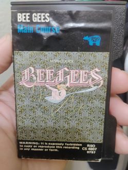 Vintage 1975 Bee gees cassette untested has rare pink shell and slip case