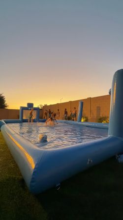 Inflatable soccer poo court