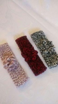 Baby girl headbands, hand crafted, made with acrylic yarns, new, fits 3months and up, $1.50 each one.