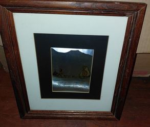 Native man canoe foil art framed