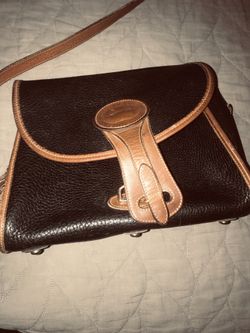 Authentic Dooney and Bourke all leather weather