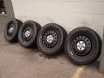 // 16" GM BLACK WHEELS AND GOODYEAR TIRES ]]