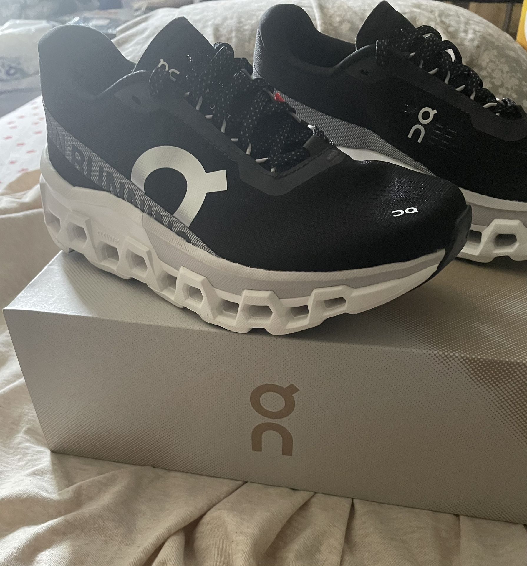ON Women’s Cloudmonster 2. Black & White Sneakers.