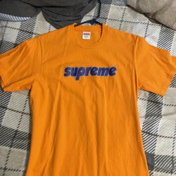 orange supreme shirt