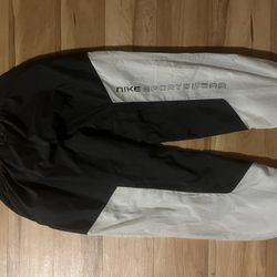 Nike Air Women's Woven Track Pants in black and white. 