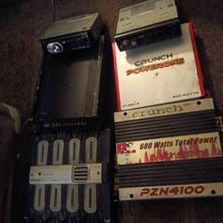 2 Automotive Radios And 4 Amps..... Used Good Condition 