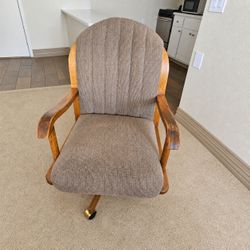 Two rolling dining chairs