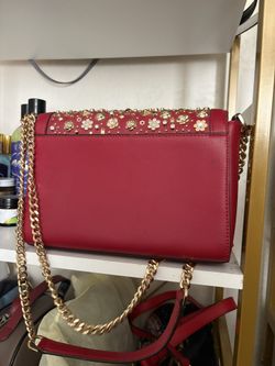 michael koers red hand bag
