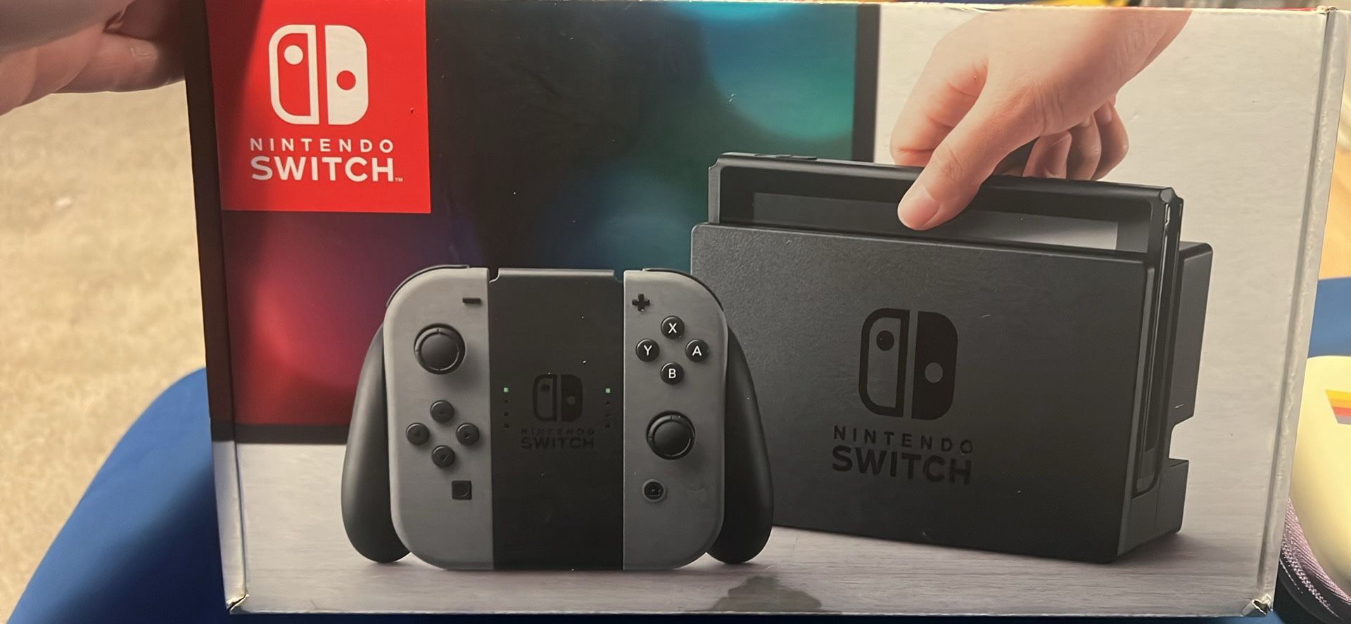 Nintendo Switch In Box With Steering Wheels, Immortals Fenyx Rising Game And Pikachu Case 