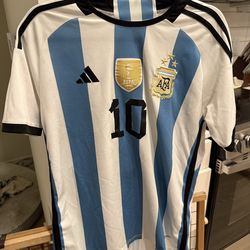 Authentic Adidas Argentina Home Jersey from the 2022 FIFA World Cup (Qatar), featuring Messi #10.