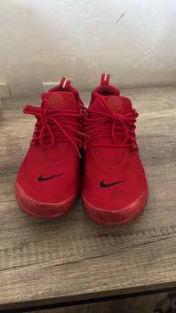Woman’s red Nikes