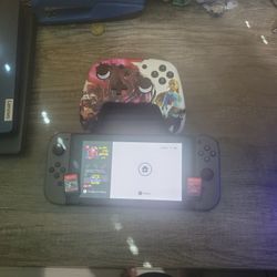 Used Almost Like New Nitendo Switch With Games And Controller.