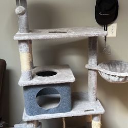 Cat tree house with multiple tiers. LOCATED IN ASTORIA, QUEENS