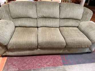 Textured light brown sofa and love seat
