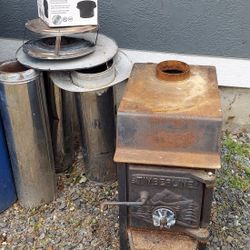 Timberline Wood stove and Insulated pipe