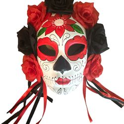 Mask the day of the dead Roses and ribbons multicolour deluxe mask has roses and ribbons in the color of red and black The mask has eye cutouts and it