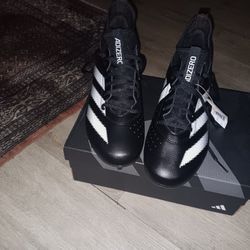 Adidas Football Cleats.