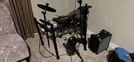 Electric drum set with amp