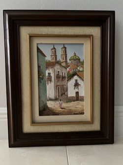 Oil painting in wooden frame.